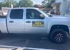 Zoe’s Mobile Tire Service pickup truck with the business sign on the door